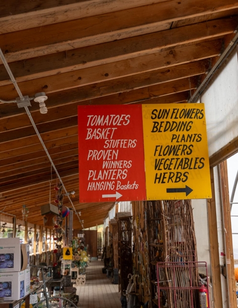 Sign that shows selling of vegetables at The Berry Barn