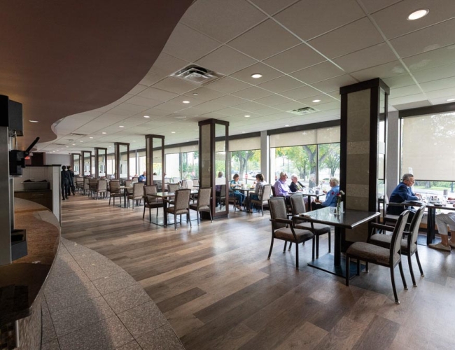 people enjoying food at the restaurant at Parktown Hotel