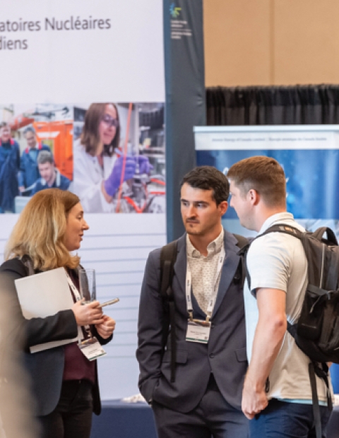 people talking at a conference 