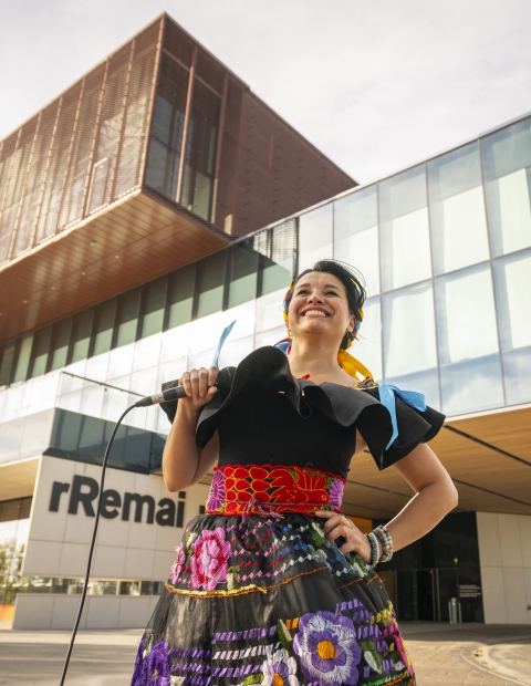 Woman standing in front of a building 