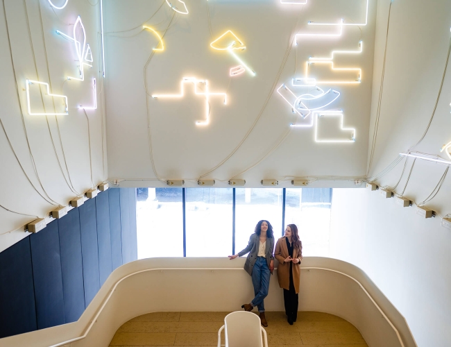 Ladies standing in stairwall