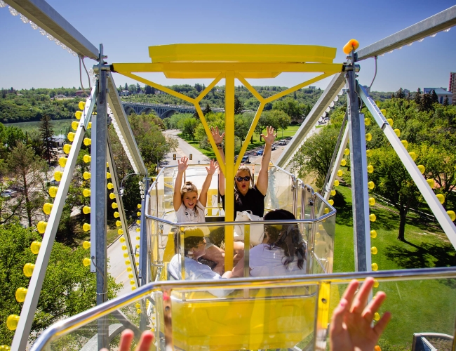 Family riding a ferris wheel